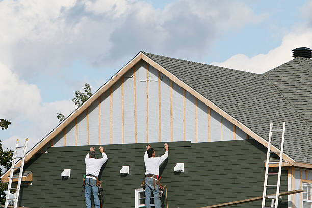 Professional Emergency Siding Repair technician working in Williamstown, WV